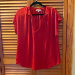 Used.  Bright red.  Rounded hem.  Drop sleeve
